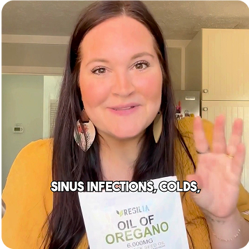 Woman holding a bottle of Resilia Oil of Oregano with text overlay about sinus infections and colds.