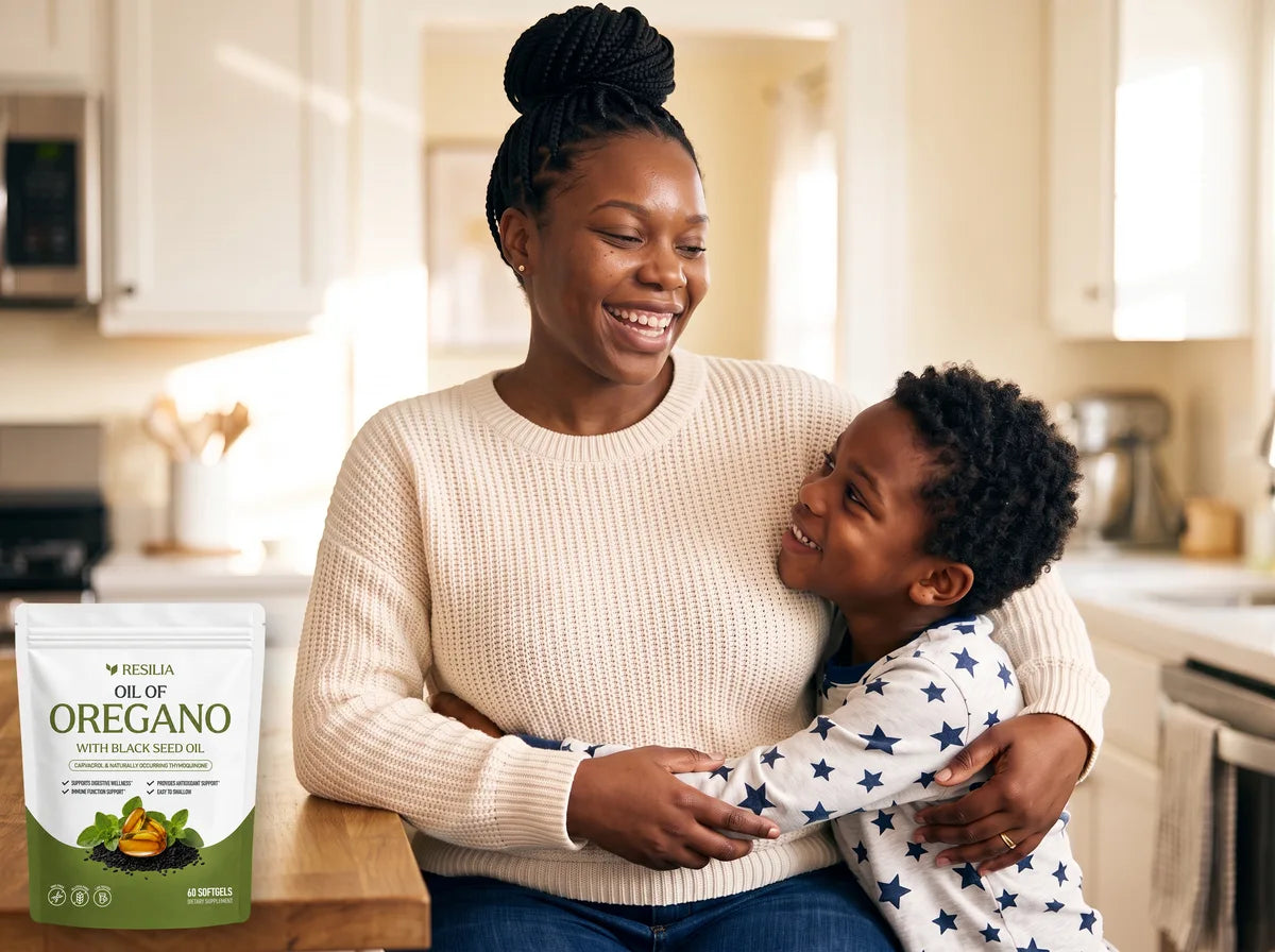 Maya laughing in her kitchen as her son Leo hugs her
