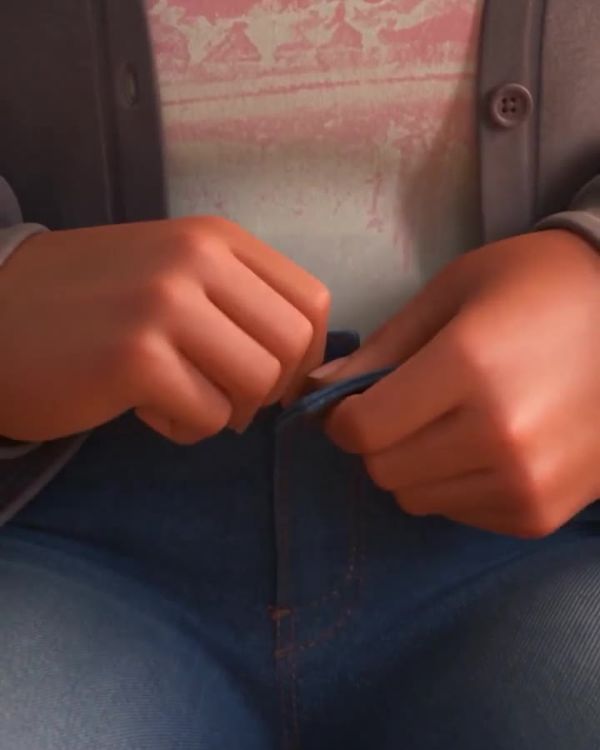 Buttoning her jeans